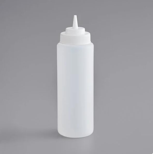 Single clear wide-mouth squeeze bottle on a gray background
