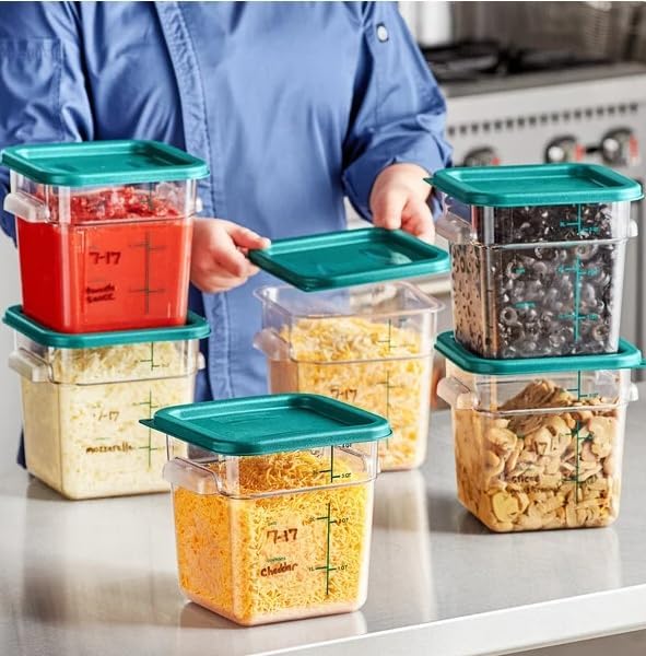 Stacked green-lid containers filled with kitchen ingredients